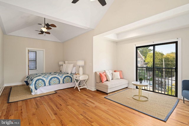 bedroom featuring ceiling fan, vaulted ceiling, wood-type flooring, and access to outside