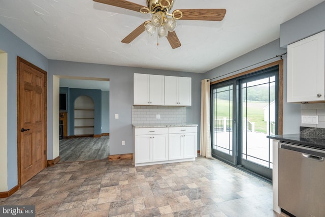 kitchen featuring ceiling fan, stainless steel dishwasher, light tile patterned floors, and tasteful backsplash