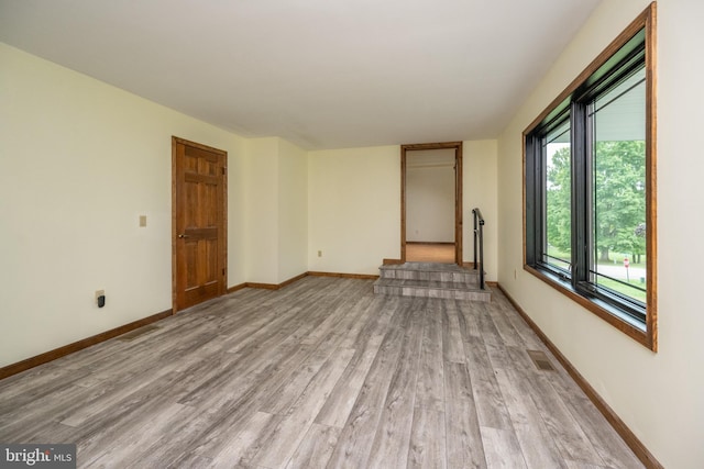 empty room featuring hardwood / wood-style flooring