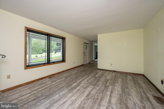 empty room featuring hardwood / wood-style floors