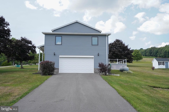 view of property exterior with a garage and a lawn