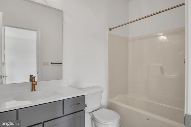 full bathroom featuring vanity, shower / washtub combination, and toilet