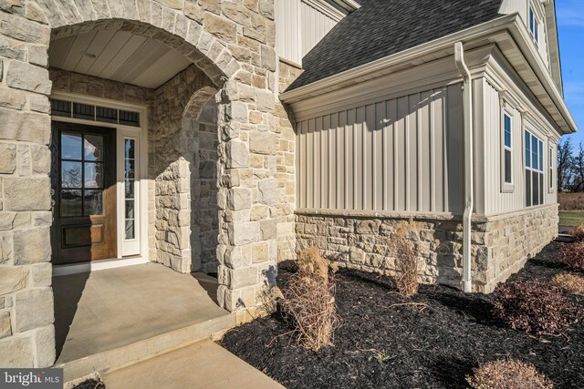 rear view of property with a yard and a patio