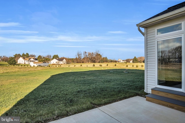 view of yard with a patio area