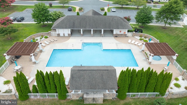 view of swimming pool featuring a patio