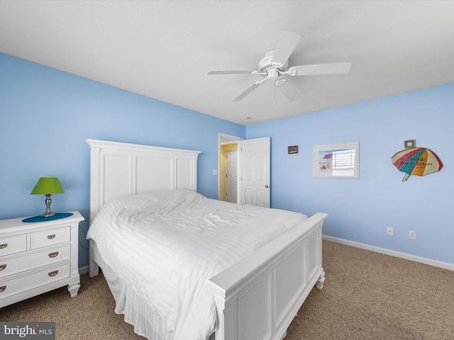 bedroom featuring light colored carpet and ceiling fan