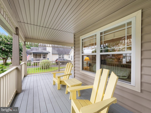 wooden terrace with covered porch