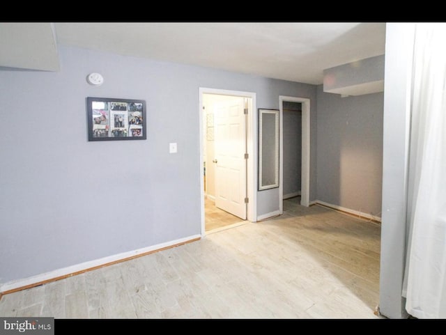 empty room featuring light hardwood / wood-style floors