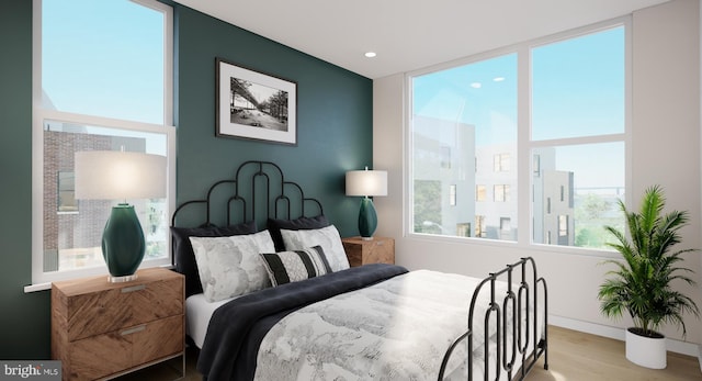 bedroom featuring hardwood / wood-style flooring