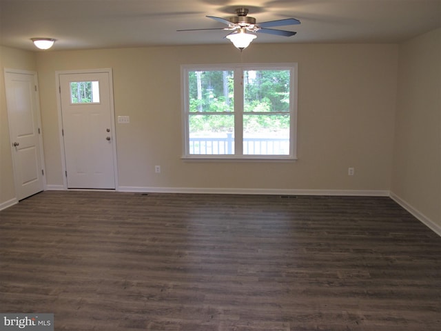 foyer entrance featuring dark hardwood / wood-style flooring and ceiling fan