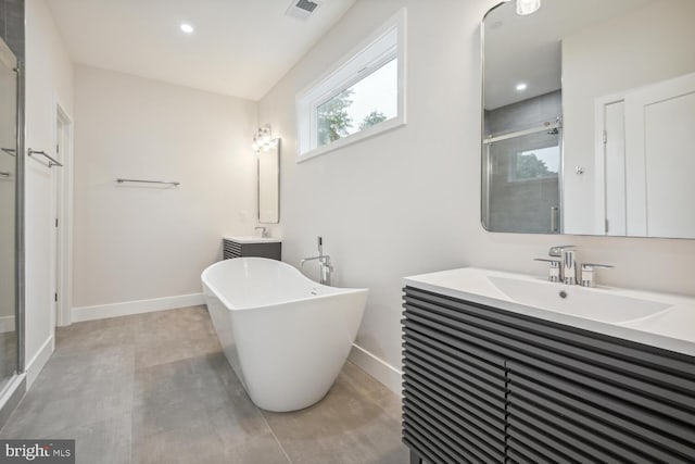 bathroom featuring vanity, shower with separate bathtub, and tile patterned flooring