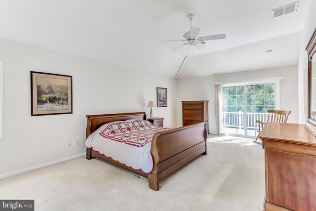 bedroom featuring light carpet, vaulted ceiling, access to exterior, and ceiling fan