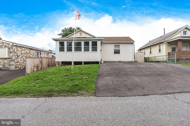 view of front of home with a front yard