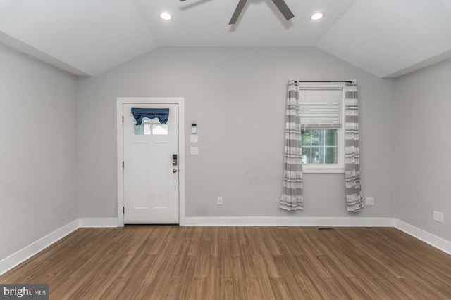 entryway featuring ceiling fan, wood-type flooring, and lofted ceiling