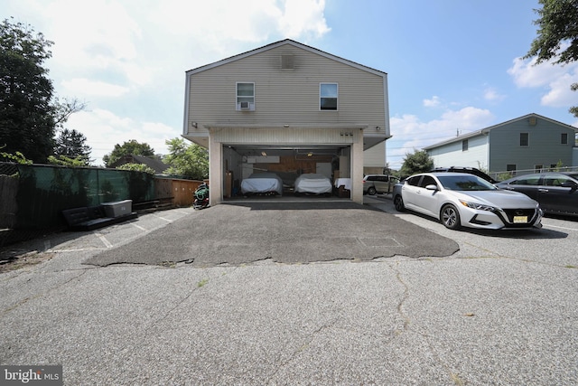 view of property exterior featuring a garage