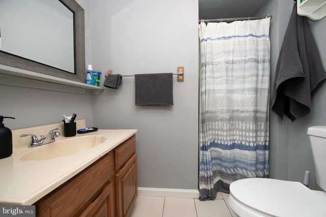 bathroom with a shower with curtain, tile patterned flooring, toilet, and vanity