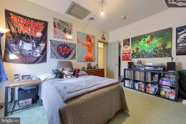 carpeted bedroom with lofted ceiling