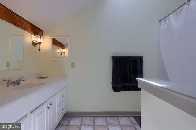 bathroom with vanity and tile patterned flooring