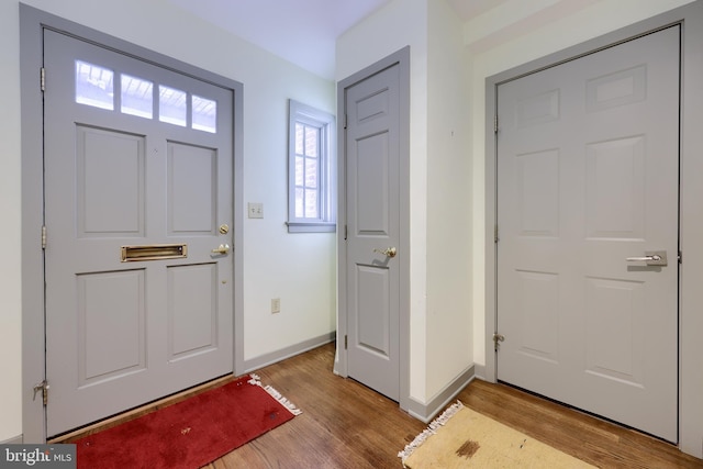 entryway with light hardwood / wood-style floors