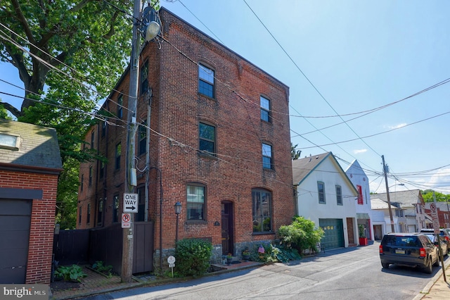 view of building exterior featuring a garage