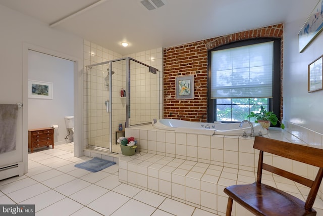 bathroom with plus walk in shower and tile patterned flooring