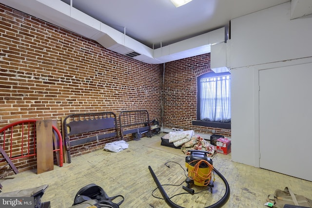 interior space with brick wall