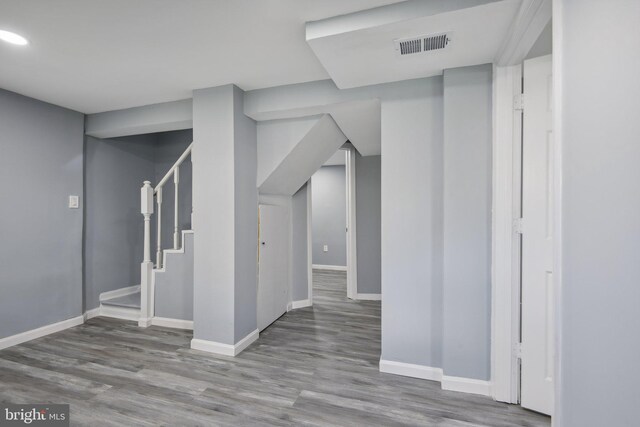 bonus room with hardwood / wood-style floors