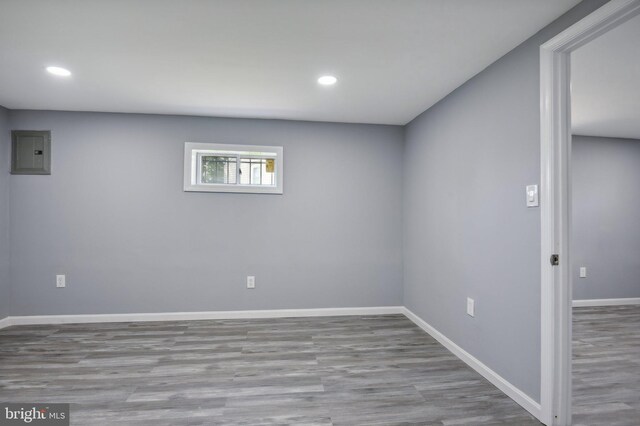 empty room featuring hardwood / wood-style floors and electric panel