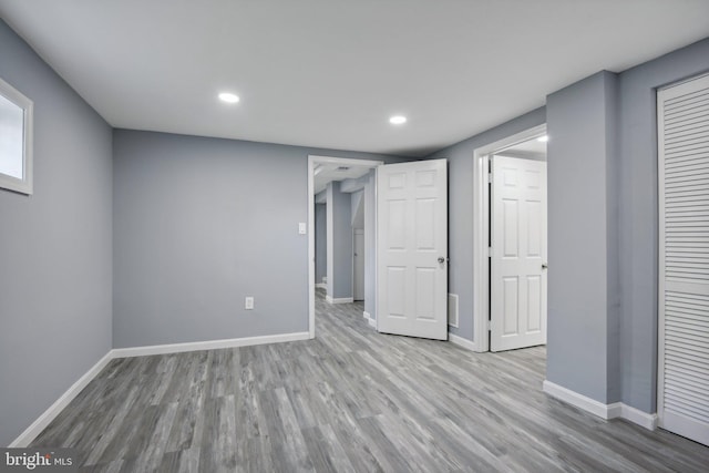 interior space with hardwood / wood-style flooring