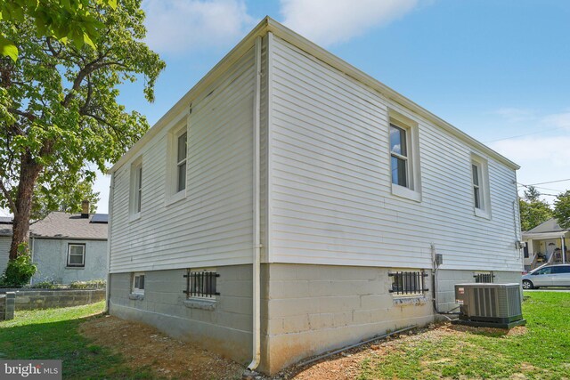 view of property exterior featuring central AC unit