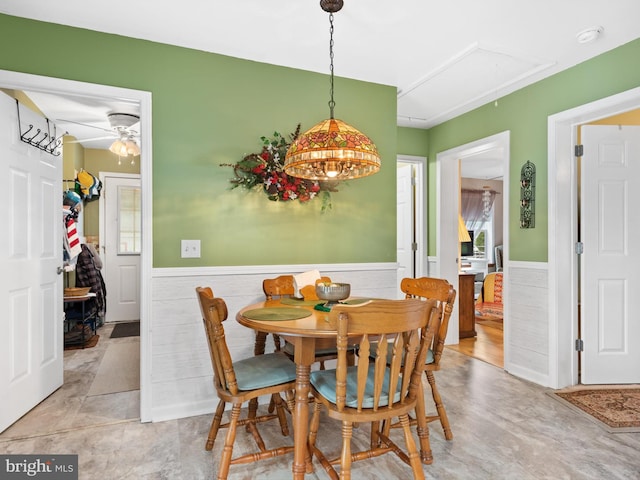 dining room featuring ceiling fan