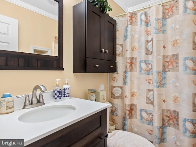 bathroom with a shower with shower curtain, ornamental molding, toilet, and vanity