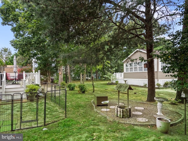 view of yard with a patio area and a fire pit