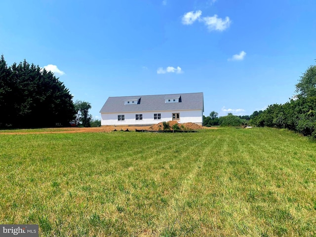 exterior space featuring a lawn