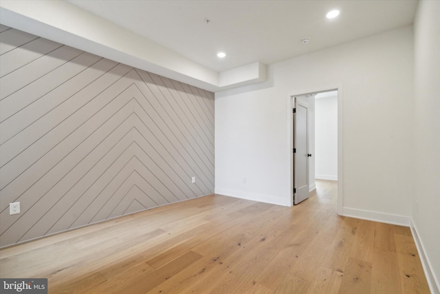 empty room with light wood-type flooring