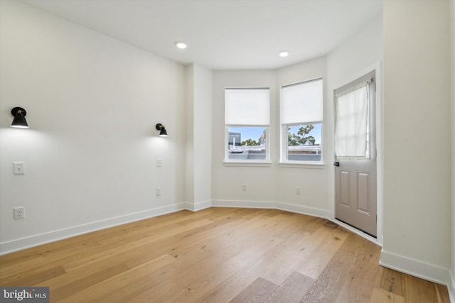 empty room featuring light hardwood / wood-style floors