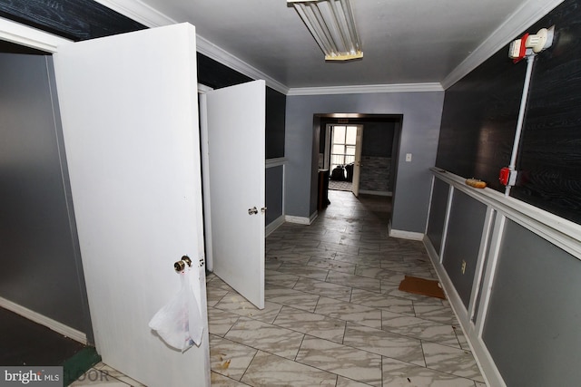 hallway featuring ornamental molding