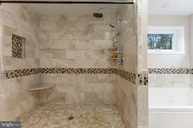 bathroom with shower with separate bathtub