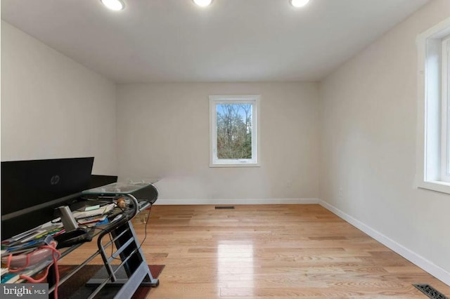 home office featuring light hardwood / wood-style flooring