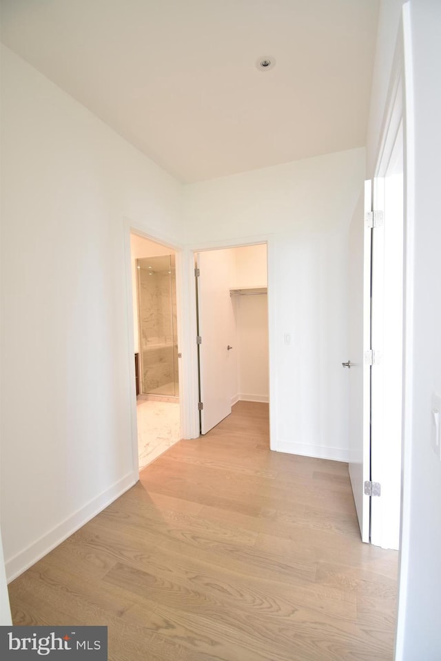 corridor featuring light wood-type flooring