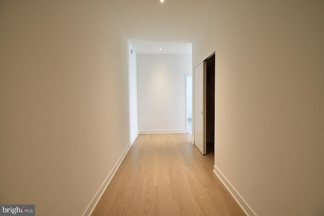 corridor featuring light wood-type flooring