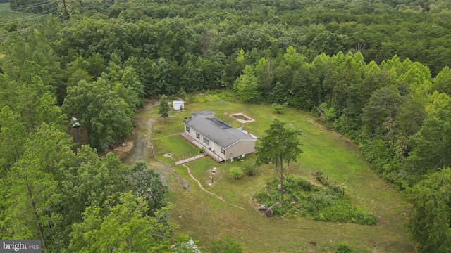 bird's eye view featuring a view of trees