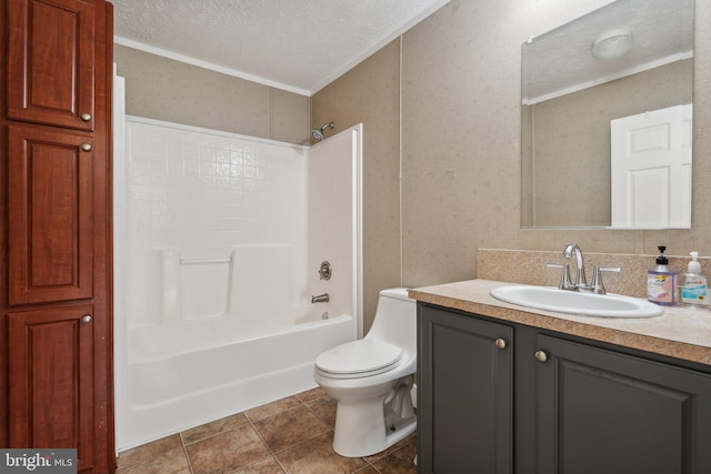 full bathroom featuring toilet, shower / tub combination, tile patterned floors, a textured ceiling, and vanity