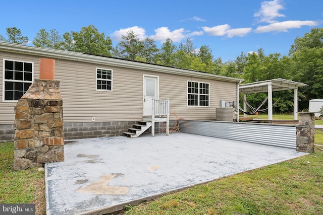 rear view of property with a patio