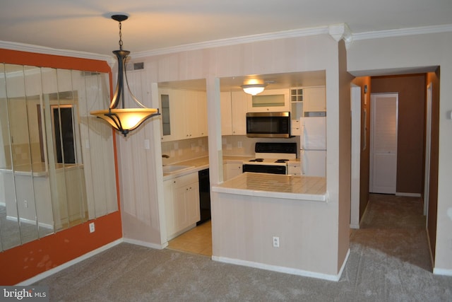 kitchen with white appliances, hanging light fixtures, light colored carpet, decorative backsplash, and white cabinetry