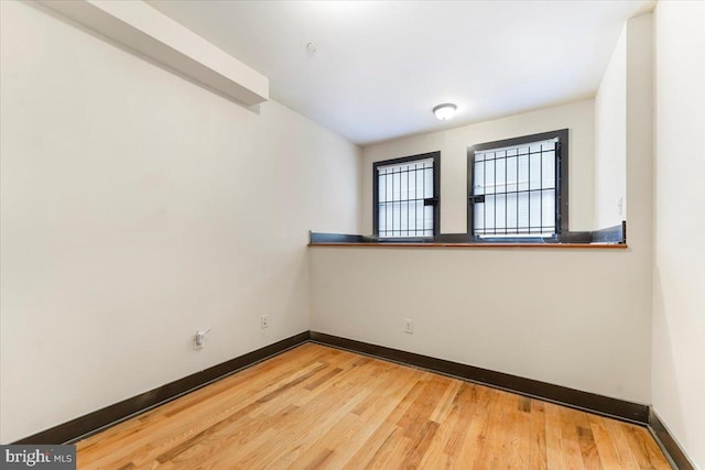 empty room with light wood-type flooring