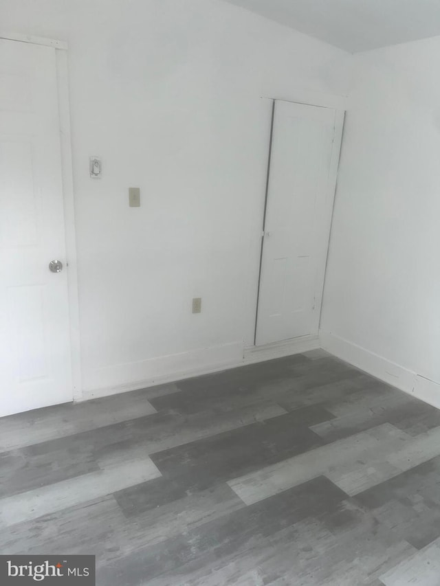 empty room featuring hardwood / wood-style floors