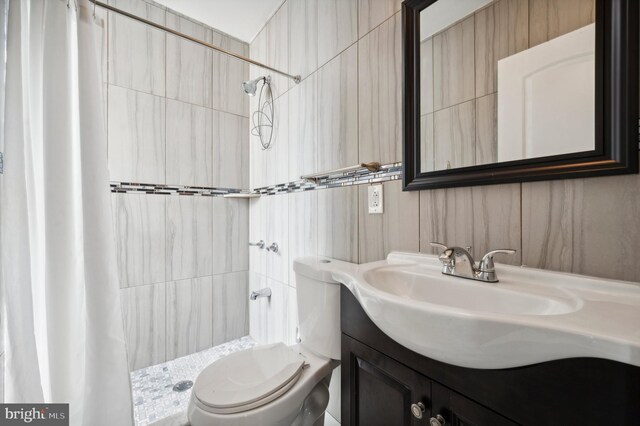 corridor with sink and tile patterned floors