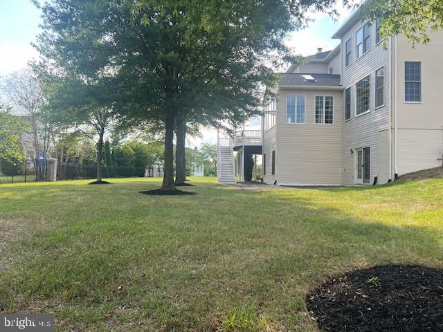 view of yard featuring stairs