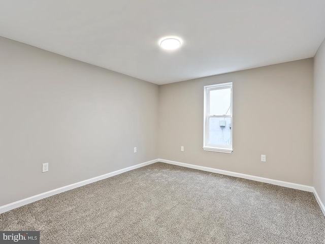 view of carpeted spare room